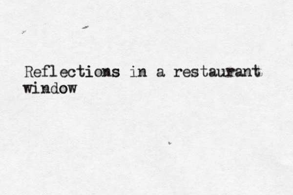 just one dollar... ...$1!... Reflectio i ns s in a restaurant window o