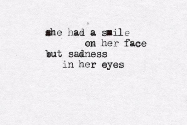 she had a smile on her face but sadness in her eyes 