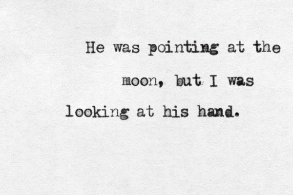 He was pointing at the moon, but I was looking at his hand. 
