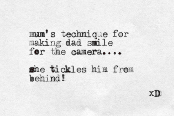 mum's technique for making dad smile for the camera.... she tickles him from behind! xD 