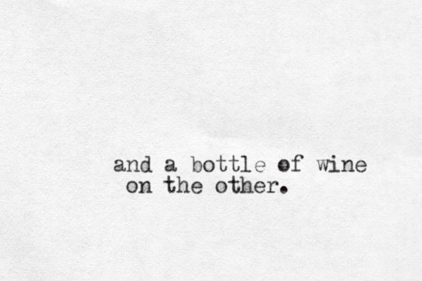 and a bottle of wine on the other.