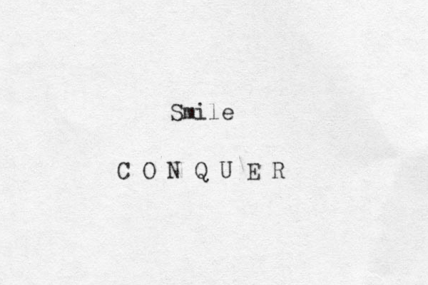 Smile C O N Q U E R 