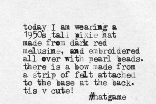 today I am wearing a 1950s tall pixie hat made from dark red melusine, and embroidered all over with pearl beads. there is a bow made from a strip of felt attached to the base at the back. tis v cute! #hatgame