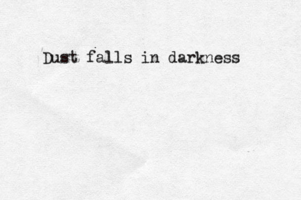 Dust falls in darkness