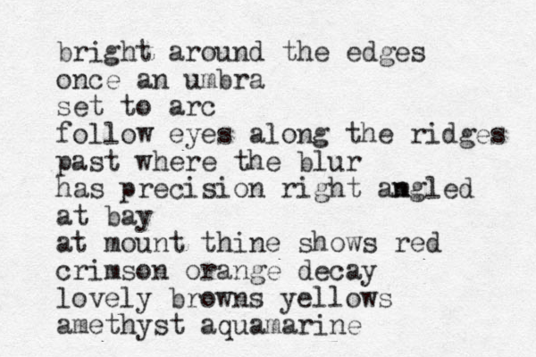 bright around the edges once an umbra set to arc follow eyes along the ridges past where the blur has precision right amgled n at bay at mount thine shows red crimson orange decay lovely browns yellows amethyst aquamarine