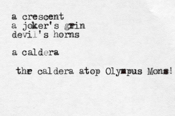 a crescent a joker's grin devil's horns a caldera thr e caldera atop Olympus Mons! 