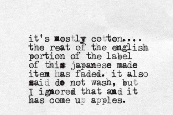 it's mostly cotton.... the reat of the english portion of the lab el of this japanese made item has faded. it also said do not wash, but I ignored that and it has come up apples. 