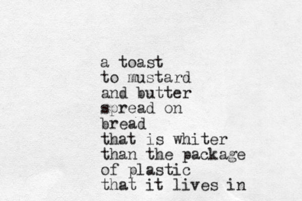 a toast to mustard and butter spread on bread that is whiter than the package of plastic that it lives in