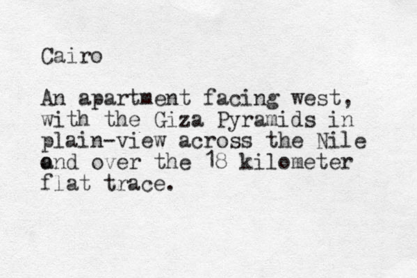 Cairo An apartment facing west, with the Giza Pyramids in plain-view across the Nile o and over the 18 kilometer flat trace. 