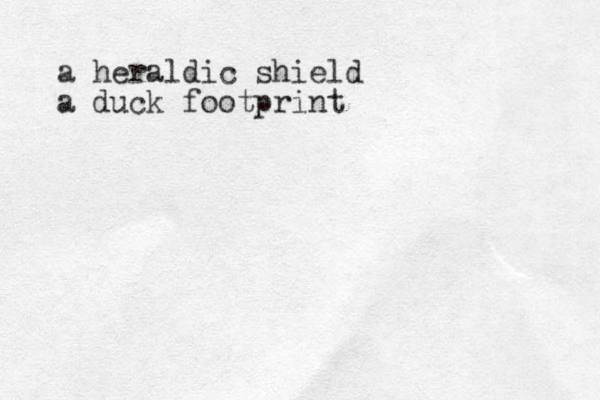 a heraldic shield a duck footprint 