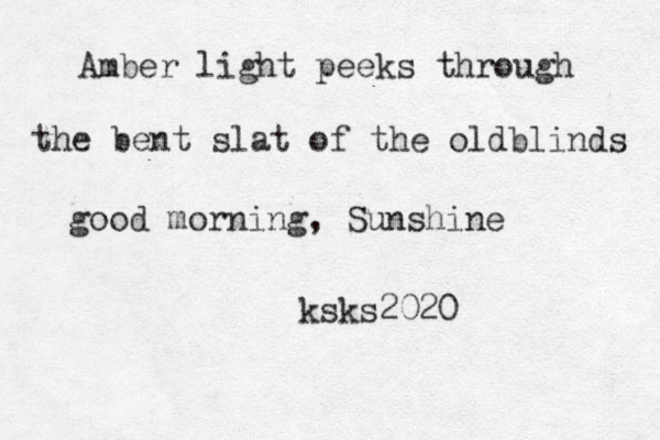 Amber light peeks through the bent slat of the oldblinds good morning, Sunshine ksks2020 