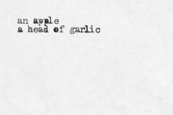 an apple a head of garlic