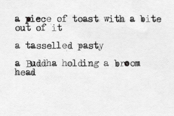 a piece of toast with a bite out of it a tasselled pasty a Buddha holding a broom head 