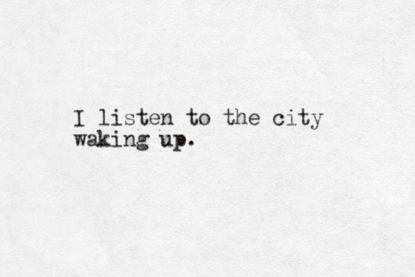 I listen to the city waking up.