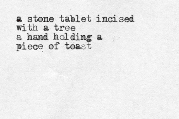 a stone tablet incised with a tree a hand holding a piece of toast