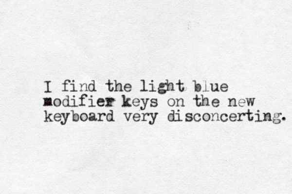 I find the light blue modifier keys on the new keyboard very disconcerting. 