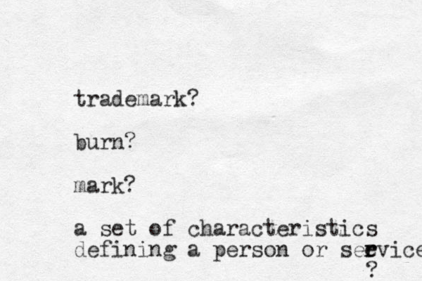 trademark? burn? mark? a set of characteristics defining a person or seevice r r ? 