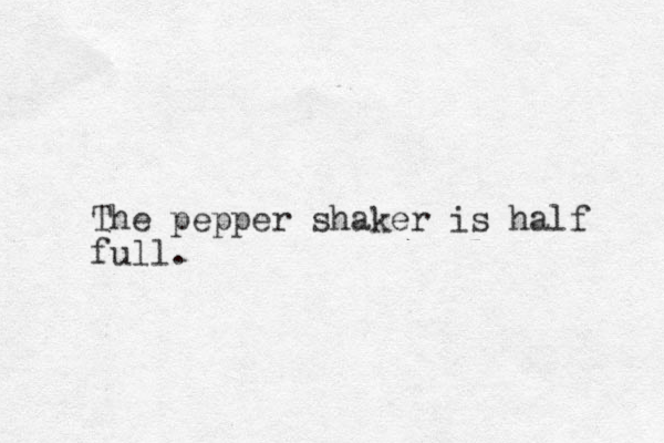 The pepper shaker is half full.