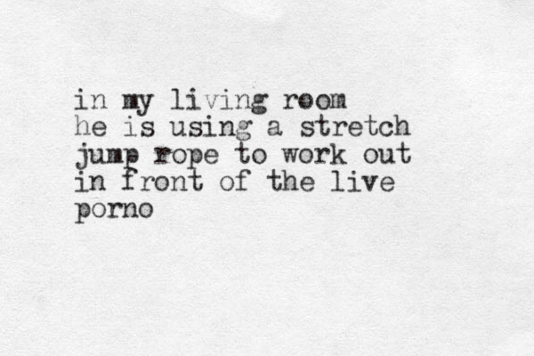 in my living room he is using a stretch jump rope to work out in front of the live porno 