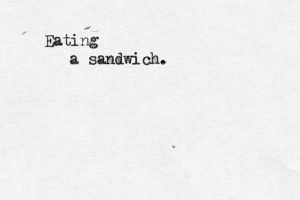 Eating a sandwich.