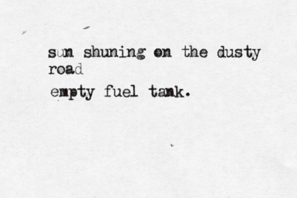 sun shuning on the dusty road empty fuel tank.