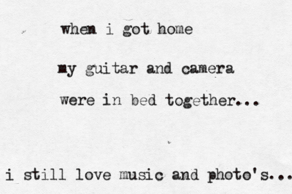 when i got home my guitar and camera were in bed i still love music and photo's... together... 